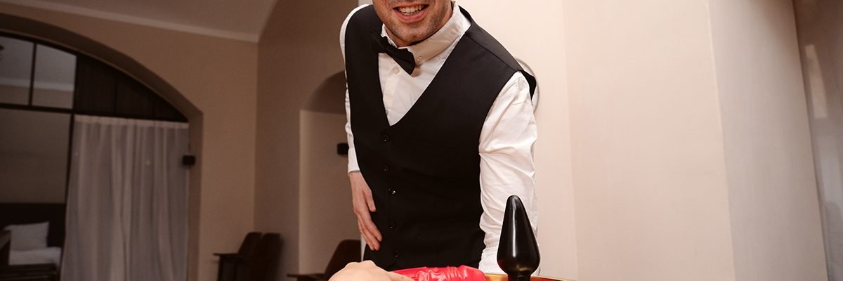 waiter serves you tray full of dildos