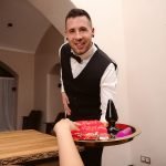 waiter serves you tray full of dildos