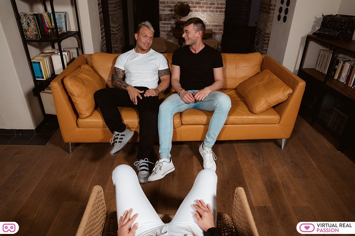 two bisexual men sitting on sofa